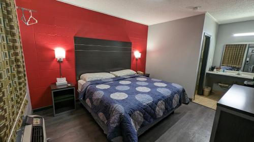 Ένα ή περισσότερα κρεβάτια σε δωμάτιο στο Sheridan Inn