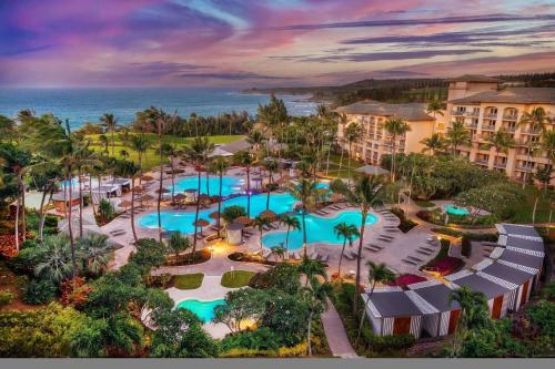 an overhead view of a resort with several pools at The Ritz-Carlton Maui, Kapalua in Lahaina