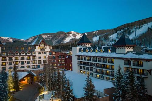 a view of a resort in the snow at night at The Hythe, a Luxury Collection Resort, Vail in Vail