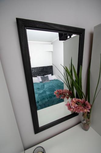 Katil atau katil-katil dalam bilik di Riia maantee Apartement