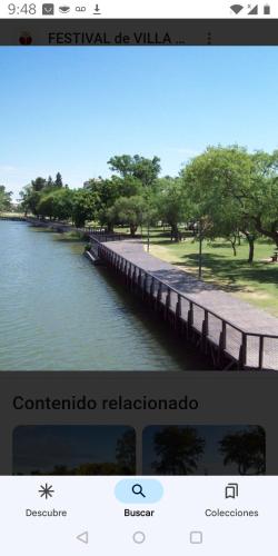 Captura de pantalla de una imagen de un puente sobre un río en Merysweet en Villa María