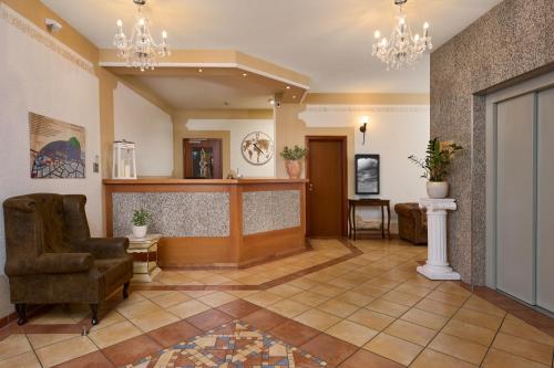 The lobby or reception area at Hotel Apollon Rust