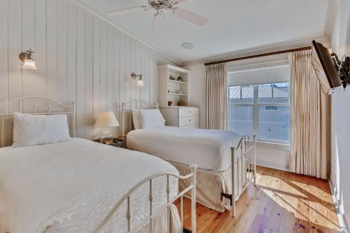 En eller flere senge i et værelse på Townhouse 3 Bedroom A