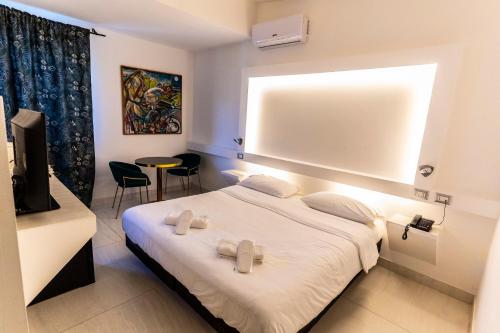 Grand hotel irpinia & Family SPAにあるベッド