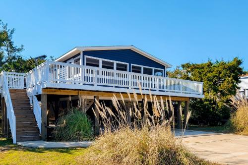 a house with a staircase leading up to it at Costa Na Mara in Frisco