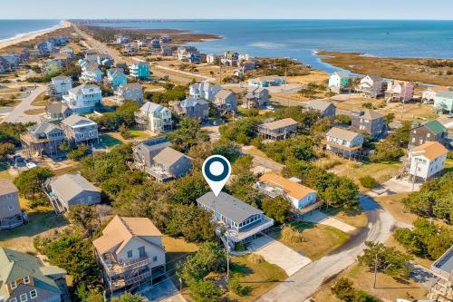 an aerial view of a neighborhood with houses and the ocean at Costa Na Mara in Frisco
