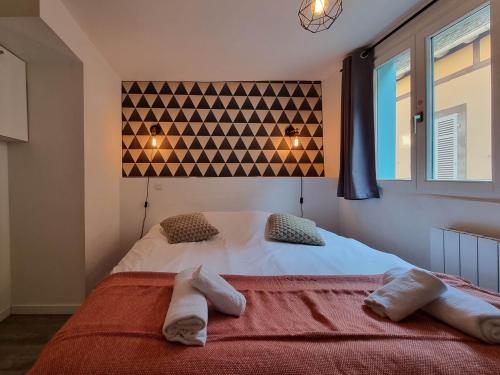 Posteľ alebo postele v izbe v ubytovaní Travel Homes - NewGate 2, elegant, heart of Colmar