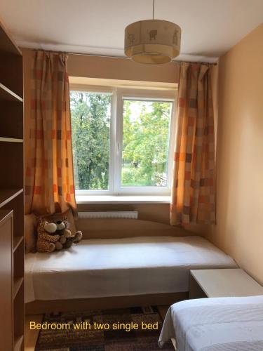 Llit o llits en una habitació de Roman