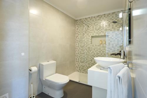 Koupelna v ubytování Cozy Beach House São Pedro Estoril