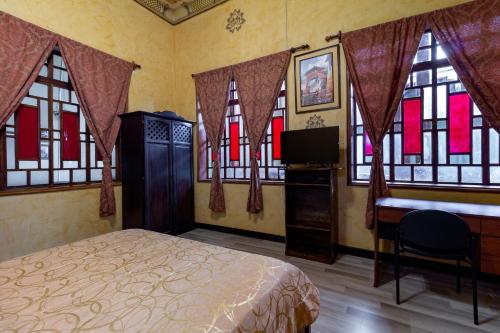 Ένα ή περισσότερα κρεβάτια σε δωμάτιο στο Hotel Majestic 1 Centro histórico Cuenca