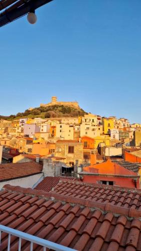 a view from the roofs of a city at Domo 'e sa rosa in Bosa