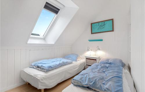 Katil atau katil-katil dalam bilik di Holiday Home Niels Plumsvej Nexø Xi