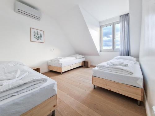 Foto Tolstov Apartments - City Apartments with 1 or 2 Rooms - 15 Min to Messe DUS and Old Town DUS 5