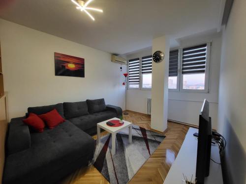 Posezení v ubytování GREY apartment