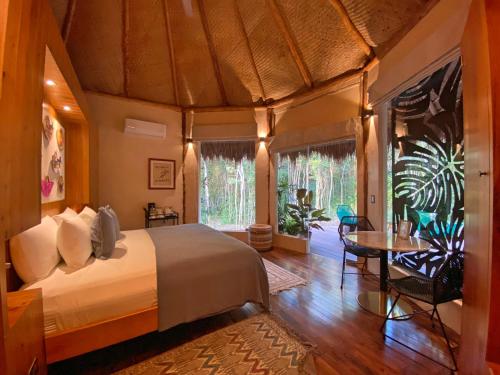 Tempat tidur dalam kamar di Casa Kaan Calakmul