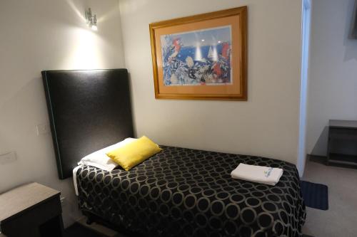 Cama o camas de una habitación en Sapphire Palms Motel