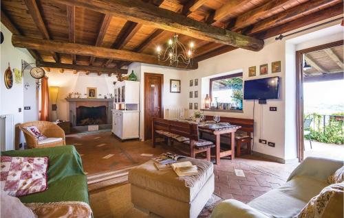 a living room with a couch and a table at Villa Luna in Vitorchiano