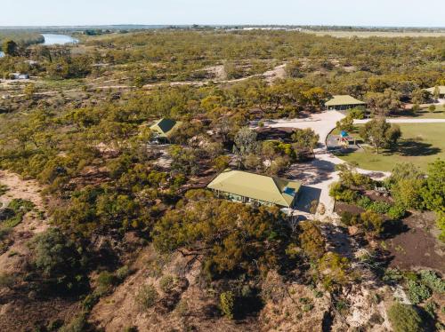 an aerial view of a house on top of a mountain at Riverbush Cottages in Monash