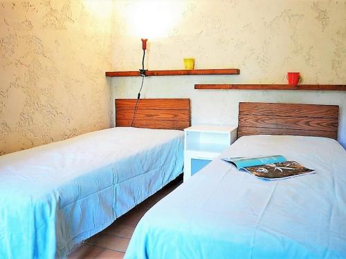 Posteľ alebo postele v izbe v ubytovaní Maison Méditerranéenne 3 Pièces avec Jardin, Proche Plage – 6 Couchages, BBQ, Garage, Terrasse - FR-1-226B-134
