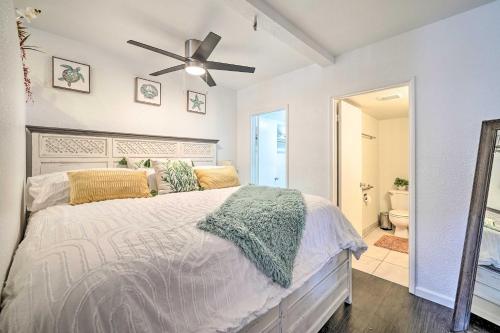 a bedroom with a bed and a ceiling fan at Parker Studio with Patio and Direct River Access! in Parker