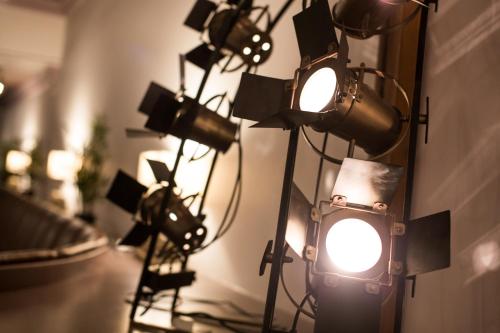 a room filled with lots of lights on a wall at Heywood Spa Hotel in Tenby