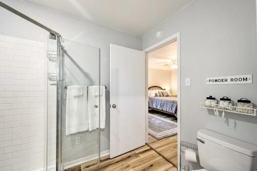 a bathroom with a shower and a toilet at Longview Vacation Rental Home 4 Mi to Dtwn in Longview