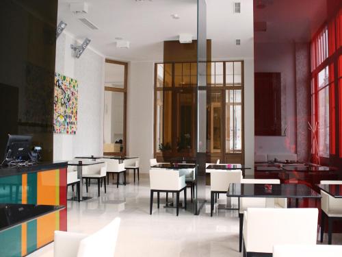 TV a/nebo společenská místnost v ubytování Hotel Lev
