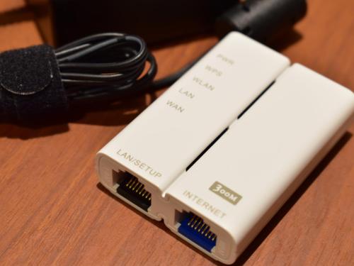 a computer adapter sitting on top of a table at Dormy Inn Premium Kyoto Ekimae Natural Hot Spring in Kyoto