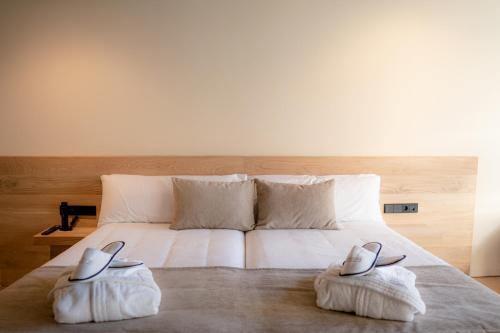 Katil atau katil-katil dalam bilik di ACOUGA Hotel Boutique