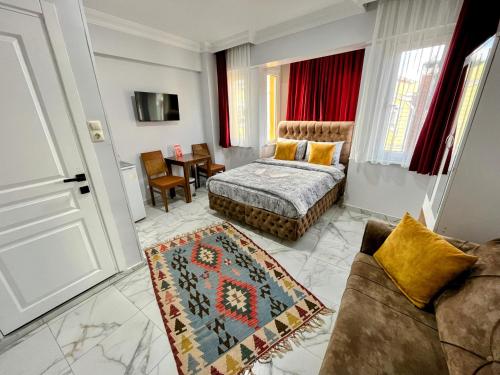 En eller flere senge i et værelse på Pembe Hotel
