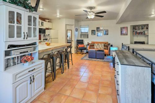 a kitchen and living room with a couch and a bed at Gazebo and Fire Pit Pet-Friendly Payson Home! in Payson