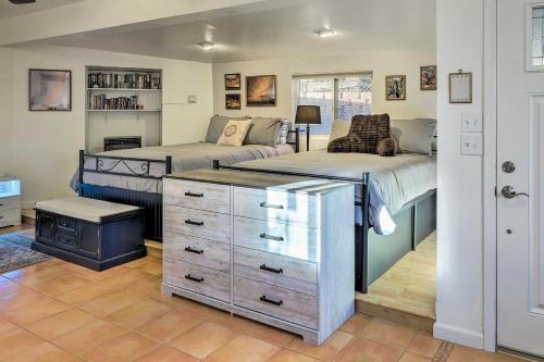 a bedroom with two beds and a dresser at Peaceful Pet-Friendly Payson Vacation Rental in Payson