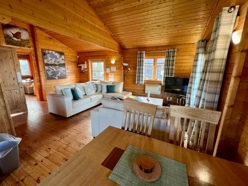 Χώρος καθιστικού στο Reeds Lodge, Lake Pochard