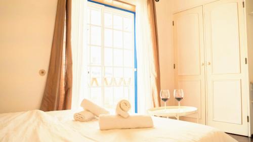 Katil atau katil-katil dalam bilik di Ericeira Soulsurfers Guesthouse