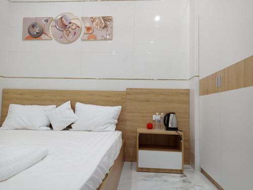Postel nebo postele na pokoji v ubytování Motel Hòa Hiệp