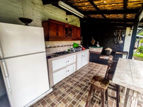 Köök või kööginurk majutusasutuses Melao Hostel Campestre y Vivero