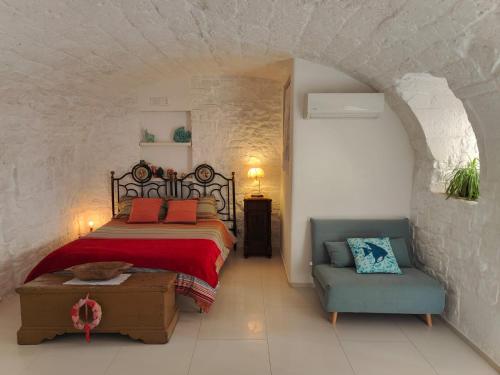 Postel nebo postele na pokoji v ubytování B&B La Torretta