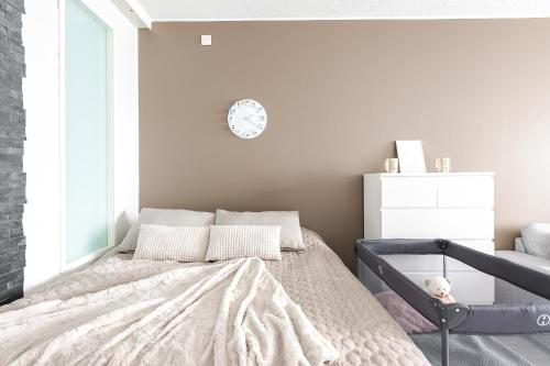 Postel nebo postele na pokoji v ubytování Kaunis koti Tampereella