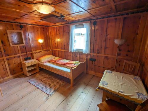 Postel nebo postele na pokoji v ubytování Ferienhaus Fatlar