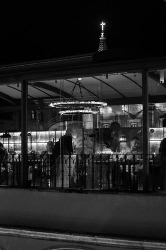 a black and white photo of a restaurant at night at Casa 1810 Hotel Boutique in San Miguel de Allende