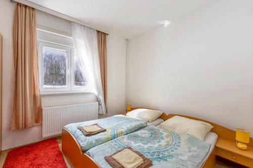 Katil atau katil-katil dalam bilik di Apartman Vedro Polje
