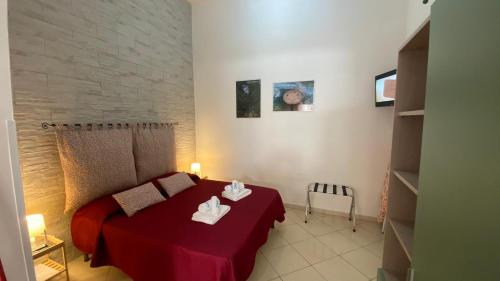 Katil atau katil-katil dalam bilik di O'Paisi Casa Vacanze