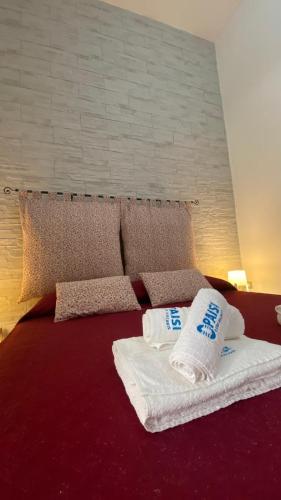 Katil atau katil-katil dalam bilik di O'Paisi Casa Vacanze