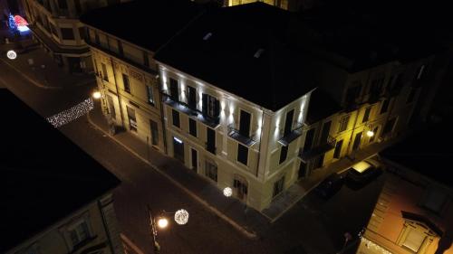 an overhead view of a building at night with lights at Volsci Rooms in Sora
