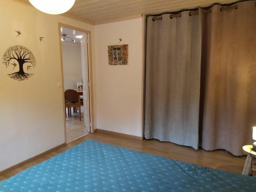 Postel nebo postele na pokoji v ubytování Appartement dans un chalet de montagne