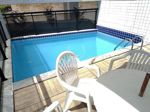 The swimming pool at or close to Ametista 5 Ponta Verde Maceió