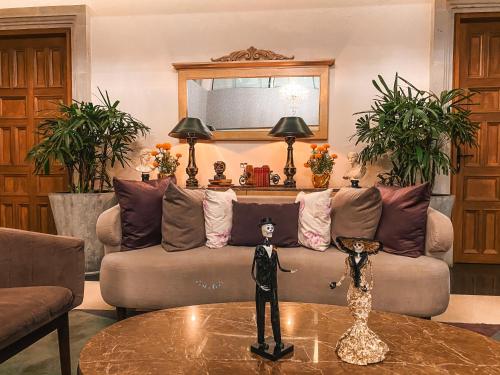 Ein Sitzbereich in der Unterkunft Hotel Real Maestranza