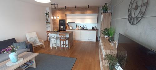 an aerial view of a living room and kitchen at NOVA Apartment in Sanok