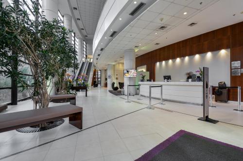 Ο χώρος του λόμπι ή της ρεσεψιόν στο Suite at the Grand Plaza Avenida Paulista