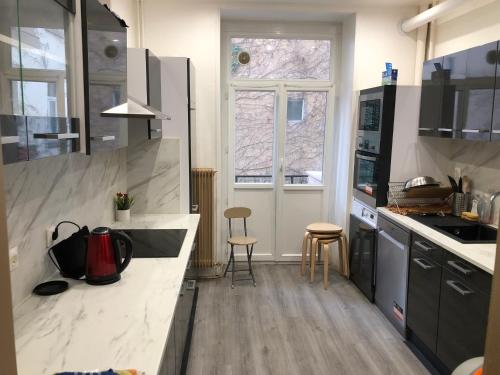 Photo de la galerie de l'établissement Grand 4p Strasbourg orangerie 7 personnes proche d Allemagne, à Strasbourg